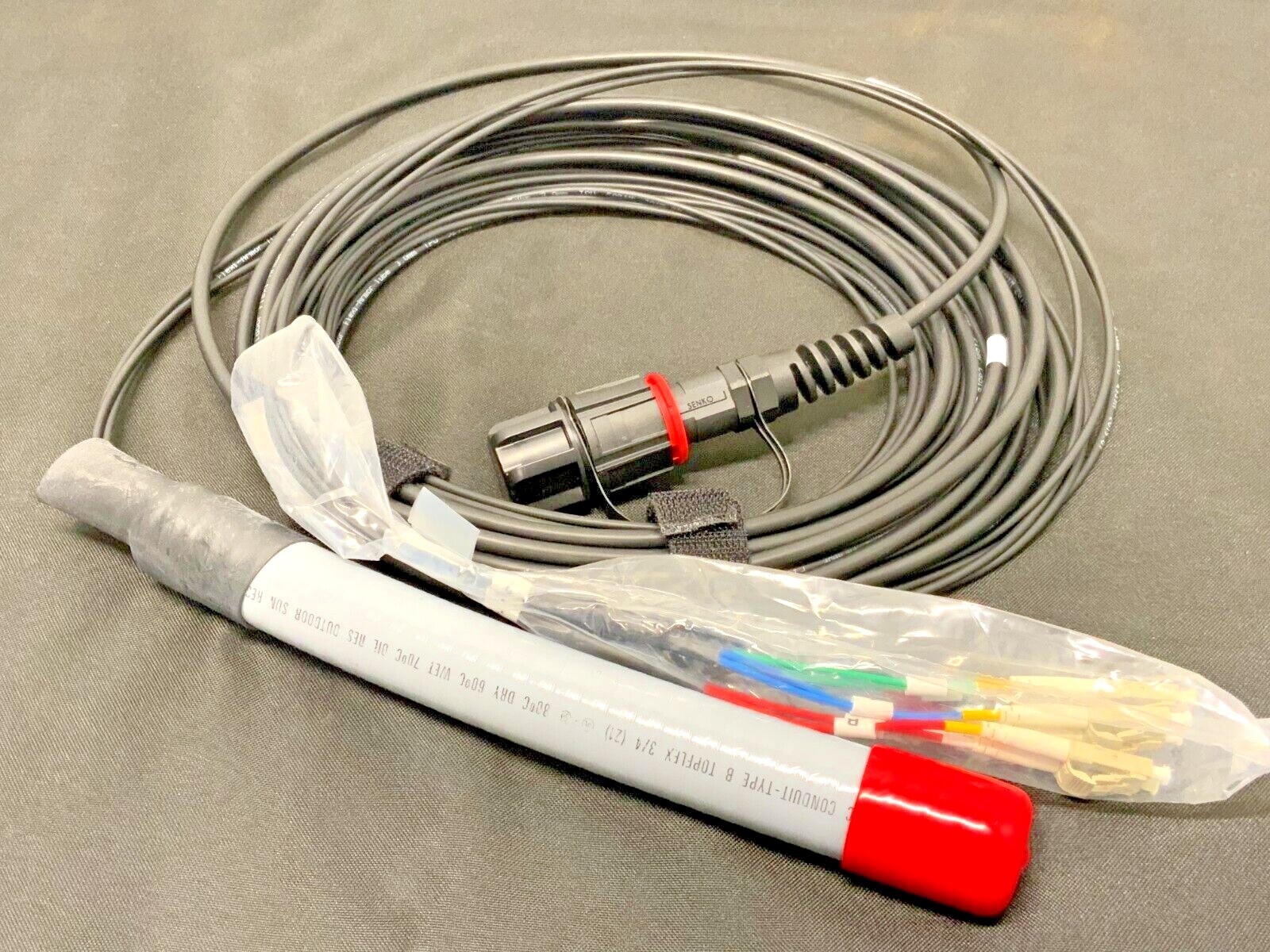 IP-MPO Male/LC-UPC OM3 50um Mini Armored 12 Strand I/O LSZH 30′ CUIJ12MM30-REVA